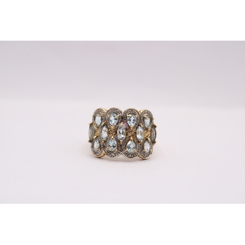 45 - A 14ct Fancy Design Tear Drop Topaz Ring&nbsp;Weight: 5g Size: N