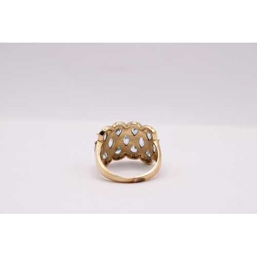 45 - A 14ct Fancy Design Tear Drop Topaz Ring&nbsp;Weight: 5g Size: N