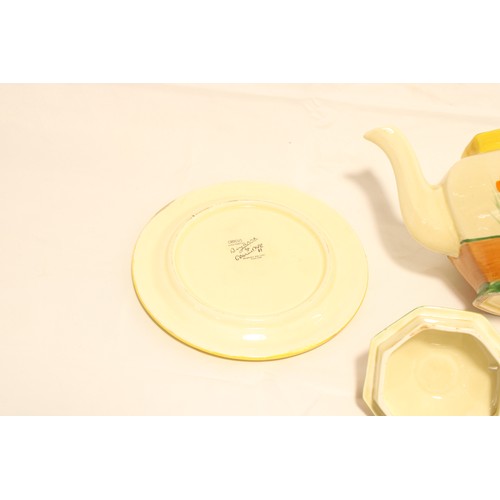  A Circa 1930/40's Clarice Cliff Bizarre 'Crocus' pattern teapot & Plate hand-painted with sprays... 
