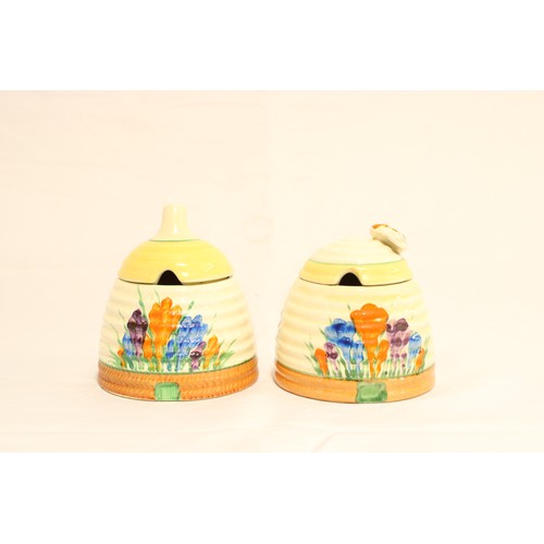  A Pair of Circa 1930/40's Clarice Cliff Crocus Pattern Beehive Honey Pots central ribbed body, hand-... 