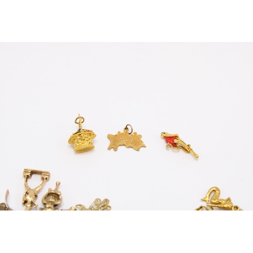 62 - Two charm bracelets. One with lose charms and clasp requires repair. With marks indicating, or testi... 