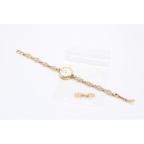  A Ladies 9ct Accurist Watch, Featuring a white dial with gold hands & indices&nbsp;Gross Weight:... 