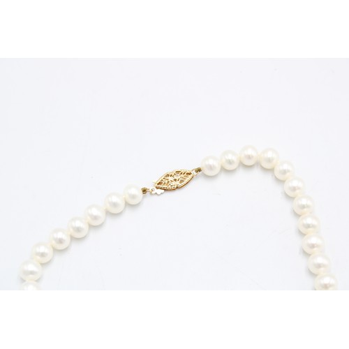 73 - A 14ct Clasped Row of Cultured Pearls&nbsp;Length: 44cm&nbsp;