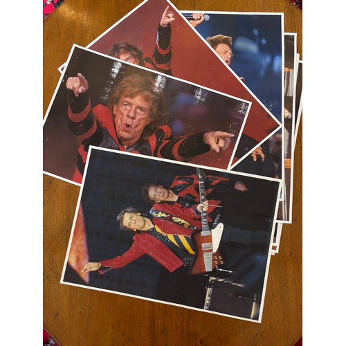 504 - A group of photographs of The Rolling Stones, including two framed images of the group, the frames 3... 