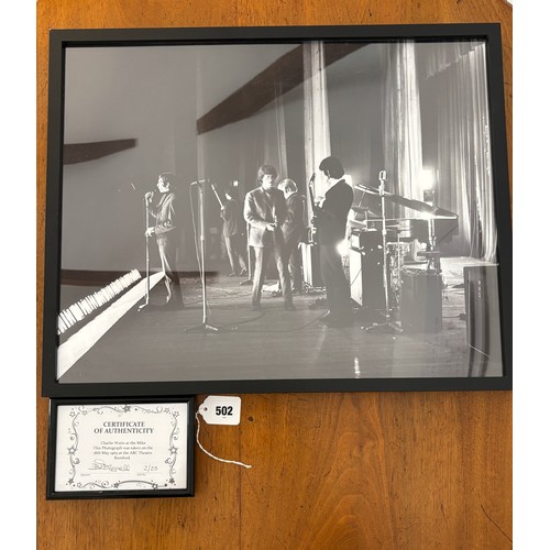 502 - A framed photograph of The Rolling Stones, performing live on stage 18 May 1965 at the ABC Theatre i... 
