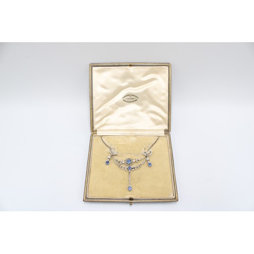20 - An Early 20th Century Edwardian Diamond & Sapphire Necklace, Featuring a central marquise-shaped... 