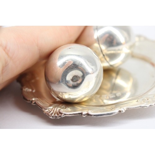 296 - Sterling Silver Dish with Decorative Border, 10cm diameter, together with two Salt and Pepper Shaker... 