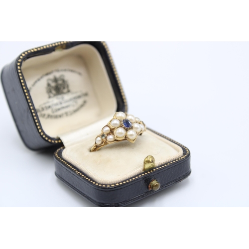 19 - A Victorian 18ct Tested Mourning Ring, Featuring a central cluster of pearls set with a sapphire.&nb... 