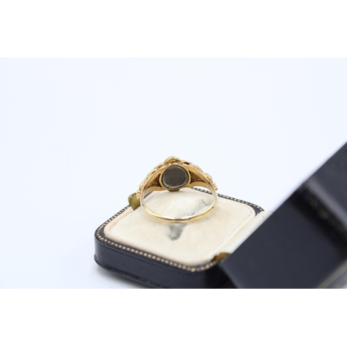 19 - A Victorian 18ct Tested Mourning Ring, Featuring a central cluster of pearls set with a sapphire.&nb... 