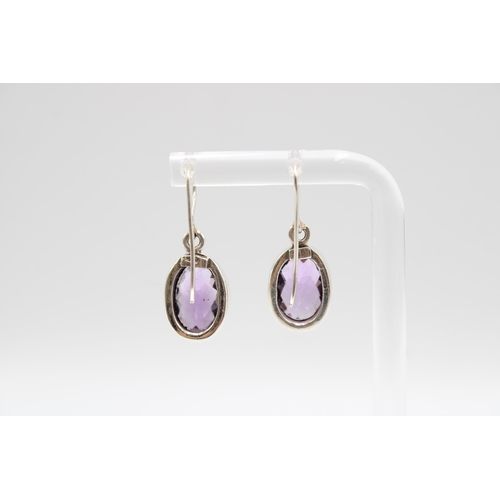 206 - A Pair of Large Amethyst Drop Ear Rings, Amethysts are a Good Colour and Well Matched, Head Size app... 