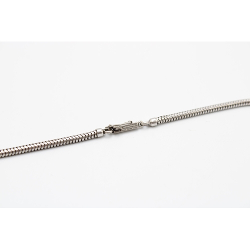 198 - An Art Deco Sterling Silver & Marcasite Necklace with circular motifs Length: 43cm