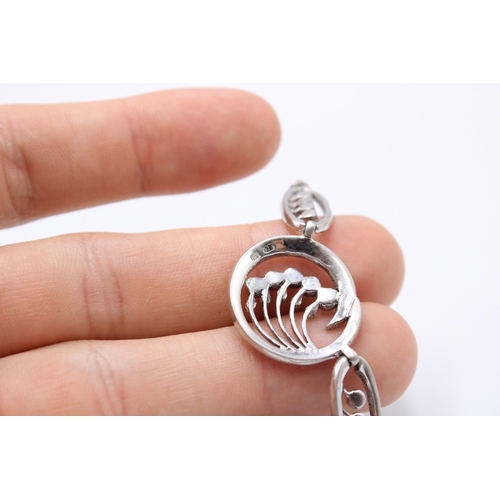 198 - An Art Deco Sterling Silver & Marcasite Necklace with circular motifs Length: 43cm