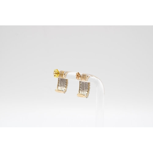 40 - A pair of 9ct gold diamond ear cuffs. Each designed as five brilliant cut diamond lines. Estimated t... 