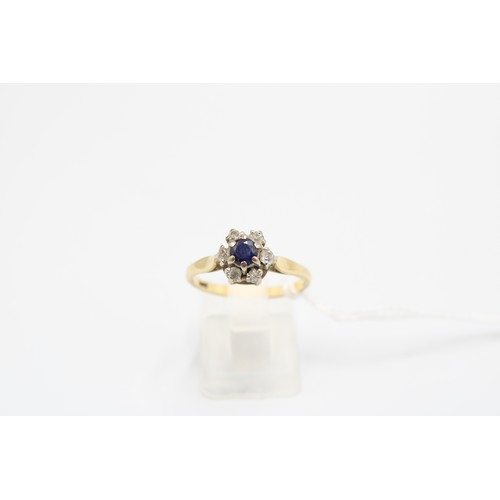  An 18ct Sapphire & Diamond Cluster Ring Weight: 3.41g Size: O