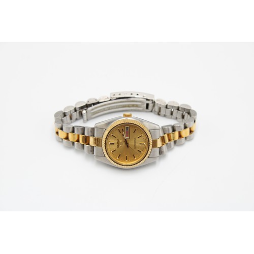  A Ladies Vintage Stainless Steel Seiko Automatic With Day/Date. Champagne dial, gold hands & bat... 