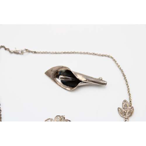 A group of silver jewellery, including a brooch, Mexico City, in the form of a calla lily, stamped 9... 