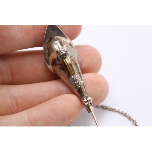 A group of silver jewellery, including a brooch, Mexico City, in the form of a calla lily, stamped 9... 