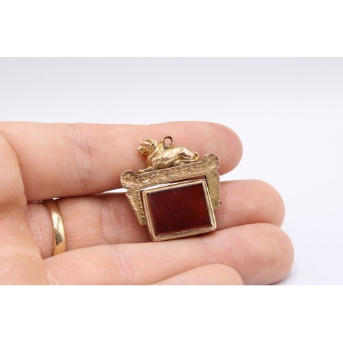  Three 9ct gold-mounted fob seals, late 19th and early 20th centuries, the first a bloodstone and car... 