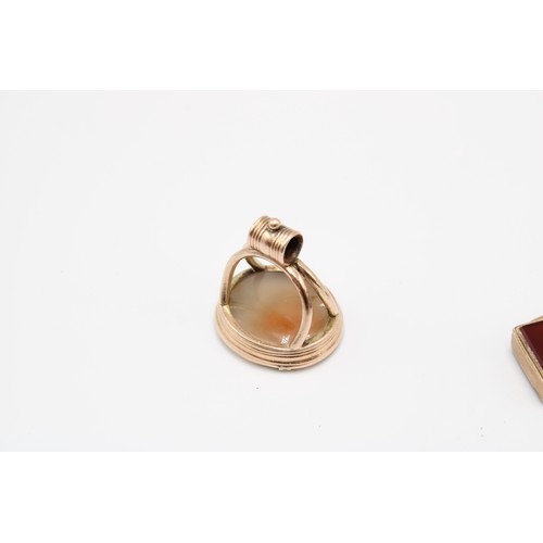  Three 9ct gold-mounted fob seals, late 19th and early 20th centuries, the first a bloodstone and car... 