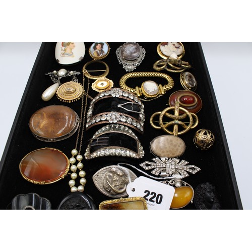  An interesting collection of jewellery, late 18th century and later, including 24 brooches, some Etr... 