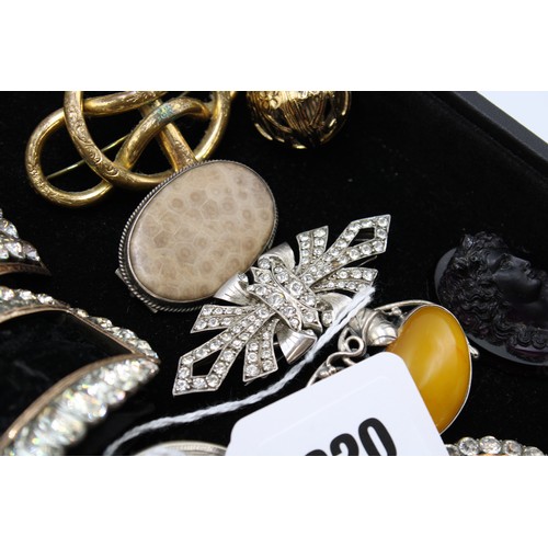  An interesting collection of jewellery, late 18th century and later, including 24 brooches, some Etr... 