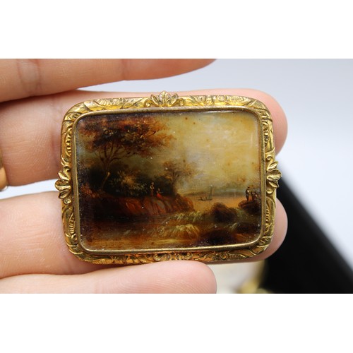  An interesting collection of jewellery, late 18th century and later, including 24 brooches, some Etr... 