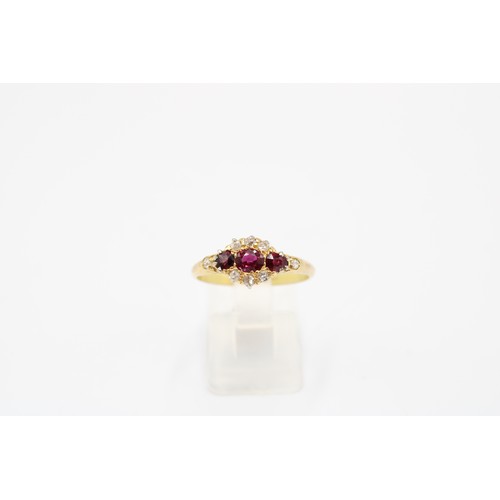  An Early 19th Century Ruby & Diamond Cluster Ring, Featuring Three Central Bright Rubies Surroun... 