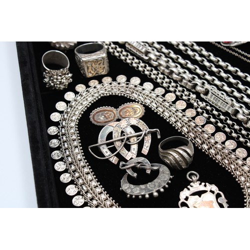  A group of silver jewellery, comprising six brooches, two set with hardstones and semi-precious gems... 