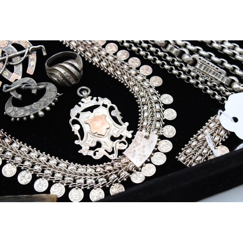  A group of silver jewellery, comprising six brooches, two set with hardstones and semi-precious gems... 
