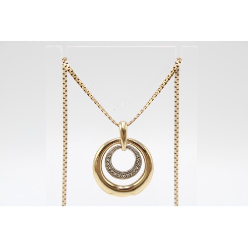 34 - A 9ct Yellow & White Gold Circular Pendant on 'S' Link Chain Weight: 7.26g Length: 50cm... 
