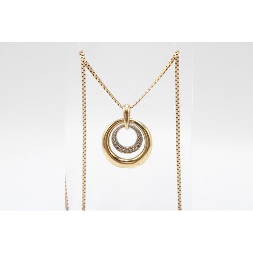 34 - A 9ct Yellow & White Gold Circular Pendant on 'S' Link Chain Weight: 7.26g Length: 50cm... 