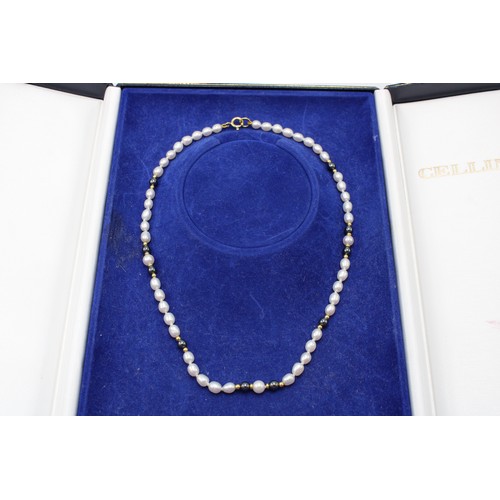 35 - A Cellini Freshwater Pearl Necklace approx. 38cms Long, Interspaced with 18ct Yellow Gold Beads with... 