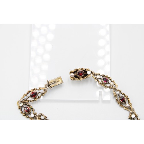 39 - An Austro-Hungarian Garnet and Mother of Pearl Necklace Circa 1880 of Festoon Design, Set in Silver ... 