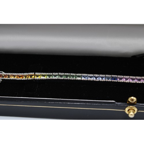 2 - A Quality 9ct White Gold Natural Diamonds and Multi Colour Sapphire Bracelet, Total Weight approx. 1... 