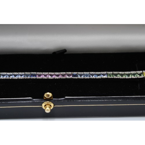2 - A Quality 9ct White Gold Natural Diamonds and Multi Colour Sapphire Bracelet, Total Weight approx. 1... 