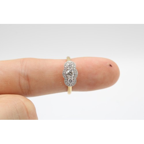 13 - An 18ct Diamond Three Stone Cluster Ring, Approximately 0.64ct Total Carat Weight.Weight: 3.42g Size... 