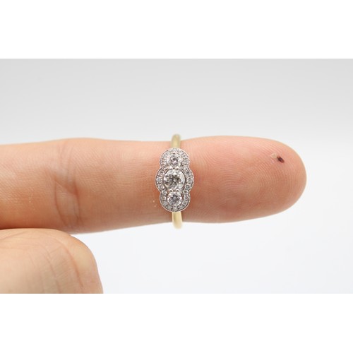 13 - An 18ct Diamond Three Stone Cluster Ring, Approximately 0.64ct Total Carat Weight.Weight: 3.42g Size... 