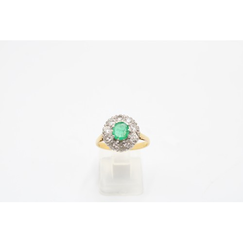 16 - An 18ct Emerald & Diamond Cluster, Central Oval Emerald 0.44ct Approximately.&nbsp;Weight: 4.29g... 