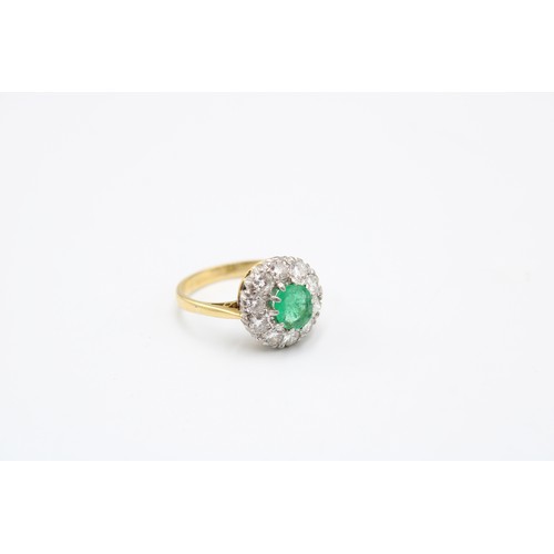 16 - An 18ct Emerald & Diamond Cluster, Central Oval Emerald 0.44ct Approximately.&nbsp;Weight: 4.29g... 