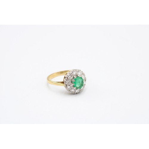 16 - An 18ct Emerald & Diamond Cluster, Central Oval Emerald 0.44ct Approximately.&nbsp;Weight: 4.29g... 