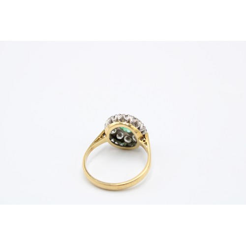 16 - An 18ct Emerald & Diamond Cluster, Central Oval Emerald 0.44ct Approximately.&nbsp;Weight: 4.29g... 