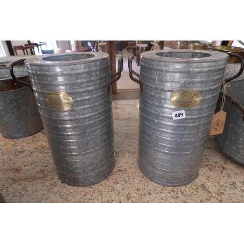 489 - A pair of Foras galvanised planters - Height 40cm