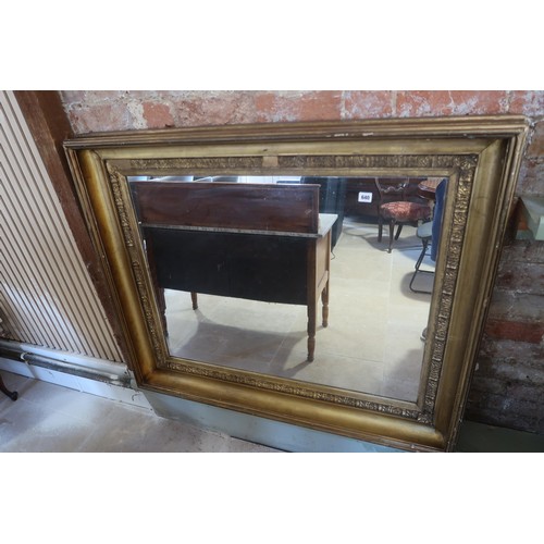 640 - A 19th century gilt over mantle mirror - 115cm x 106cm