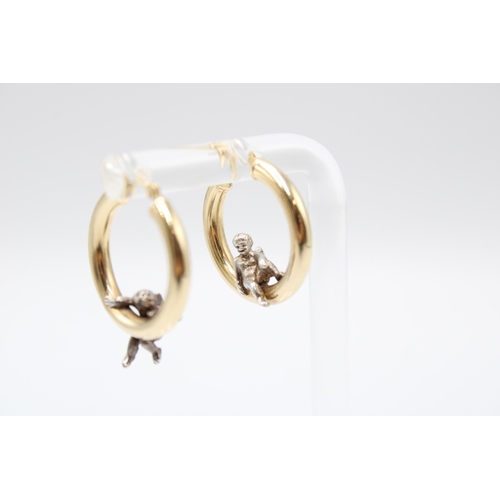 22 - A Pair of 14ct & Platinum Hoops with Seated Cherub Design, 2cm Across.&nbsp;Weight: 3g&nbsp;... 