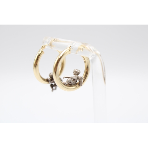 22 - A Pair of 14ct & Platinum Hoops with Seated Cherub Design, 2cm Across.&nbsp;Weight: 3g&nbsp;... 