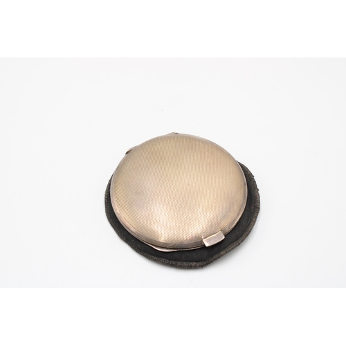 349 - A 1934 Dated Sterling Silver Circular Powder Company, Featuring a blue guilloche enamel body with en... 