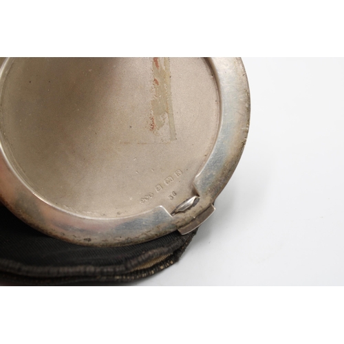 349 - A 1934 Dated Sterling Silver Circular Powder Company, Featuring a blue guilloche enamel body with en... 