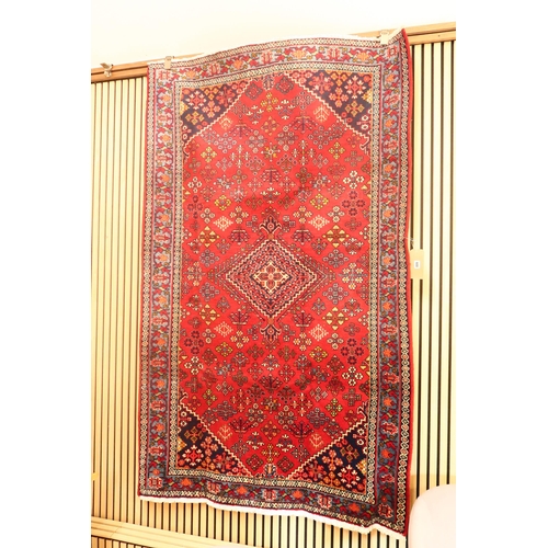 608 - A handmade woollen Josha Ghan rug - 2.11m x 1.28m