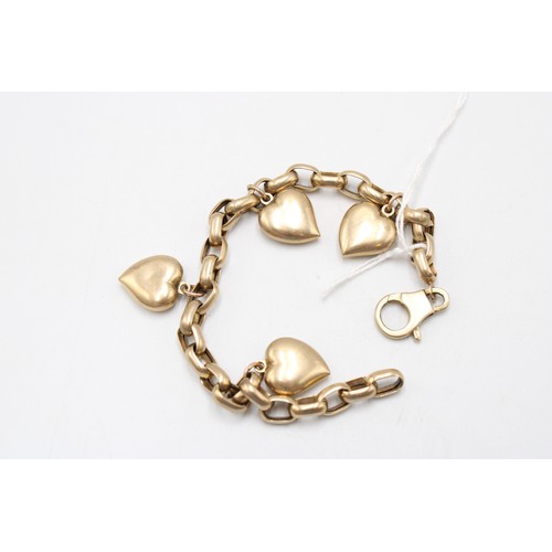  A 9ct gold belcher link bracelet with four heart charms. Length 205mm. Weight 12.91 grams