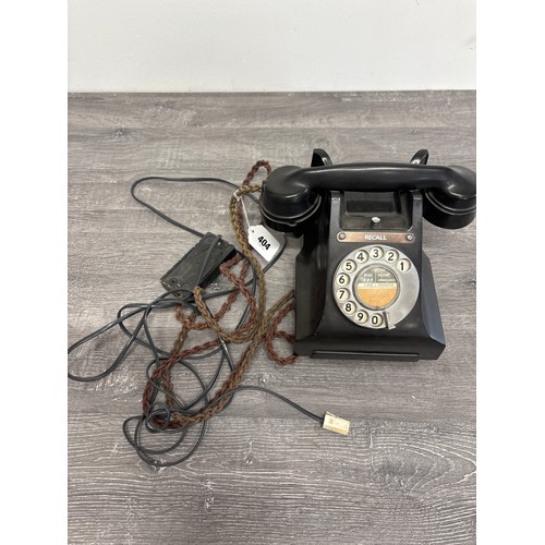  A bakelite telephone, circa 1950, GPO 300 series, rotary dial, width at base 15cm